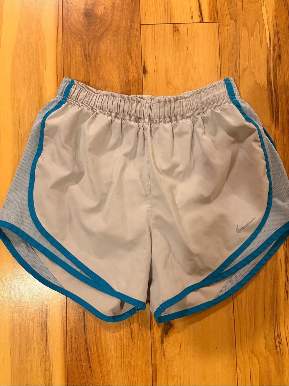 Nike Women's White Athletic Shorts with Teal Trim
